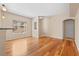 Open-concept living area features hardwood floors, natural light, and neutral paint at 8409 Running Deer Ave # 203, Las Vegas, NV 89145