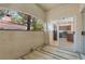 Outdoor patio featuring community views and slider entrance to the kitchen at 8409 Running Deer Ave # 203, Las Vegas, NV 89145