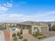 Aerial view of single-Gathering home with swimming pool, landscaping, and a two-car garage at 8668 Hartmont St, Las Vegas, NV 89166