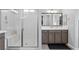 Bathroom featuring a walk-in shower with glass enclosure at 8668 Hartmont St, Las Vegas, NV 89166