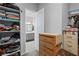 Walk-in closet leading to a bathroom at 8668 Hartmont St, Las Vegas, NV 89166