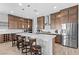 Spacious kitchen with stainless steel appliances, a large island, and lots of cabinet space at 8668 Hartmont St, Las Vegas, NV 89166
