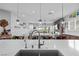 Modern kitchen flows into a spacious living area, perfect for entertaining and everyday living at 8668 Hartmont St, Las Vegas, NV 89166