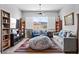 Cozy living room features plush seating, stylish decor, and ample natural light for relaxation and comfort at 8668 Hartmont St, Las Vegas, NV 89166