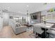 Bright and airy living room with contemporary decor, a fireplace, and plenty of seating at 8668 Hartmont St, Las Vegas, NV 89166