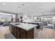 Open-concept kitchen flows into a spacious living area, perfect for entertaining and Gathering gatherings at 8668 Hartmont St, Las Vegas, NV 89166