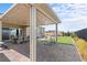 Outdoor patio with an outdoor dining and lounge area for entertaining or relaxing at 8668 Hartmont St, Las Vegas, NV 89166