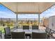 Brick-paved patio with outdoor furniture and a manicured lawn, perfect for outdoor enjoyment at 8668 Hartmont St, Las Vegas, NV 89166
