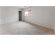 Bedroom featuring neutral carpet and a large window with a closet at 8872 Perfect Diamond Ct, Las Vegas, NV 89129