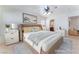 Relaxing main bedroom with a cozy bed, soft rug, and neutral decor for a calm atmosphere at 8872 Perfect Diamond Ct, Las Vegas, NV 89129