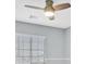 Bright bedroom featuring a ceiling fan and modern window blinds at 9010 Wine Cellar Ave, Las Vegas, NV 89148