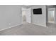 This bedroom boasts neutral paint and easy access to the upstairs hallway at 9010 Wine Cellar Ave, Las Vegas, NV 89148