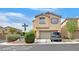 Charming two-story home featuring a two-car garage and well-maintained landscaping in a suburban neighborhood at 9010 Wine Cellar Ave, Las Vegas, NV 89148