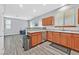 Modern kitchen adjacent to the living area with stainless steel appliances and ample counter space at 9010 Wine Cellar Ave, Las Vegas, NV 89148