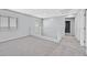 Spacious loft area with soft carpet and natural light from multiple windows at 9010 Wine Cellar Ave, Las Vegas, NV 89148