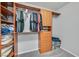 This walk-in closet offers a built-in organizing system and ample storage space at 9010 Wine Cellar Ave, Las Vegas, NV 89148