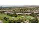 Golf course community featuring luxury townhomes with lush landscaping and scenic views at 9112 Vista Greens Way # 204, Las Vegas, NV 89134