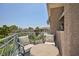 The balcony is an excellent area to relax and enjoy nature with an owl sculpture at 9112 Vista Greens Way # 204, Las Vegas, NV 89134