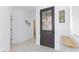 Foyer with decorative glass front door and views into other rooms at 9112 Vista Greens Way # 204, Las Vegas, NV 89134