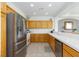 This kitchen boasts stainless steel appliances and bright countertops, perfect for cooking at 9112 Vista Greens Way # 204, Las Vegas, NV 89134
