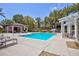 Community swimming pool with poolside lounge seating at 9112 Vista Greens Way # 204, Las Vegas, NV 89134