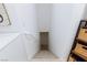 Staircase with white walls and wooden stairs at 9112 Vista Greens Way # 204, Las Vegas, NV 89134