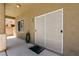 Back patio features sliding glass door, window, and outdoor lighting at 9712 Red Horse St, Las Vegas, NV 89143