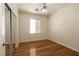 Bedroom with hardwood flooring and a sliding mirror closet at 9712 Red Horse St, Las Vegas, NV 89143