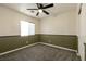 Cozy bedroom featuring carpeted floors and paneled walls at 9712 Red Horse St, Las Vegas, NV 89143