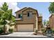 Charming two-story home with a well-maintained yard, two car garage, and desert landscaping at 9712 Red Horse St, Las Vegas, NV 89143