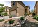 Charming two-story home has a well-maintained yard, two car garage, and desert landscaping at 9712 Red Horse St, Las Vegas, NV 89143