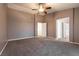 Carpeted main bedroom with an entrance to the main bath and closet at 9712 Red Horse St, Las Vegas, NV 89143