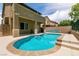 Private backyard pool with attached spa and covered patio at 9712 Red Horse St, Las Vegas, NV 89143