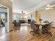 Open-concept living and dining area with hardwood floors and ample natural light at 10417 Sea Palms Ave, Las Vegas, NV 89134