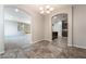 Elegant dining room showcasing tiled floors and seamless flow into other living spaces at 10917 Mount Pendleton St, Las Vegas, NV 89179