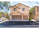 Two story home with three car garage, desert landscaping and located on a street corner at 10917 Mount Pendleton St, Las Vegas, NV 89179