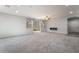 Spacious living room featuring neutral gray carpet and light gray walls, offering versatility at 10917 Mount Pendleton St, Las Vegas, NV 89179