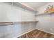 Walk-in closet with installed shelving and carpeting at 10917 Mount Pendleton St, Las Vegas, NV 89179