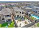 A bird's eye view of a beautiful backyard with patio and green lawn at 11652 Desert Hollow Ave, Las Vegas, NV 89138