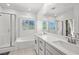 Spa-like bathroom features a large soaking tub, separate shower, and dual sinks at 11652 Desert Hollow Ave, Las Vegas, NV 89138