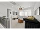 Upstairs loft featuring a cozy seating area, neutral paint colors, and great natural light at 11652 Desert Hollow Ave, Las Vegas, NV 89138