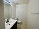 Half bathroom featuring tile flooring, updated vanity and faucet, and a clean design at 11953 Haven St, Las Vegas, NV 89183