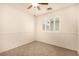 Bedroom with carpet, ceiling fan, and window for natural light at 11953 Haven St, Las Vegas, NV 89183