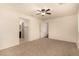 Bedroom featuring neutral colored walls and carpets and direct access to the ensuite bath at 11953 Haven St, Las Vegas, NV 89183