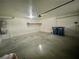 Empty garage with painted walls and concrete flooring, ready for storage or parking at 11953 Haven St, Las Vegas, NV 89183