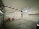 Clean and spacious two-car garage with painted walls and ceiling at 11953 Haven St, Las Vegas, NV 89183