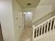 Hallway with tile floors leads to multiple rooms at 11953 Haven St, Las Vegas, NV 89183