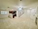 Spacious living area with tile flooring, shutters, and convenient access to the kitchen at 11953 Haven St, Las Vegas, NV 89183