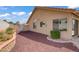 Home's backyard featuring desert landscaping and privacy wall at 1219 Heather Oaks Way, North Las Vegas, NV 89031