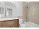 Updated bathroom featuring a tub and shower, updated vanity, and tile flooring at 1219 Heather Oaks Way, North Las Vegas, NV 89031